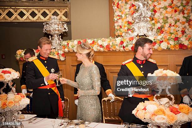 In this handout image provided by the Grand-Ducal Court of Luxembourg, Grand Duke Henri of Luxembourg, Countess Stephanie de Lannoy and Prince...