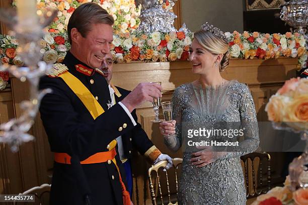 In this handout image provided by the Grand-Ducal Court of Luxembourg, Grand Duke Henri of Luxembourg and Countess Stephanie de Lannoy attend a Gala...
