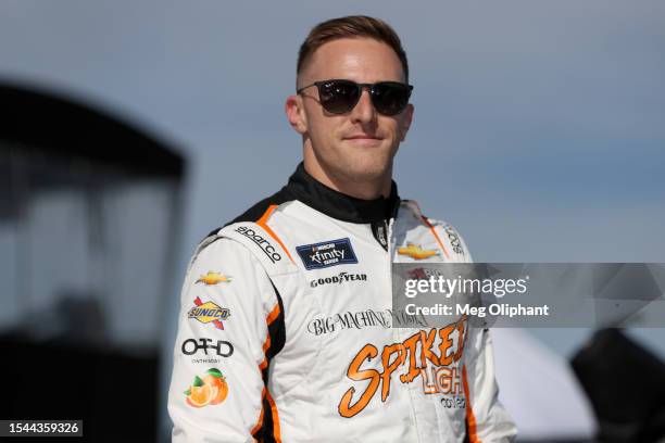 Parker Kligerman, driver of the Spiked Light Coolers Chevrolet, waits on the grid during practice for the NASCAR Xfinity Series Ambetter Health 200...