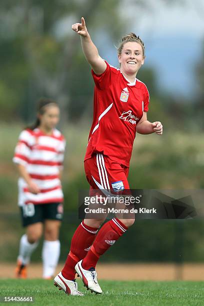 Sarah McLaughlin of Adelaide celebrates after scoring her third goal during the round one W-League match between Adelaide United and the Western...