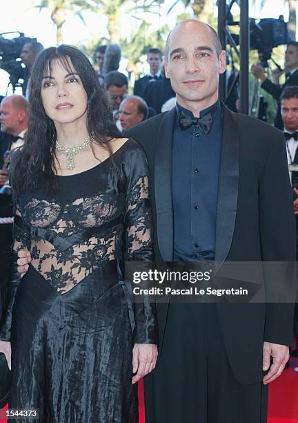 Canadian actress Carole Laure and French American actor Jean Marc Barr arrive at the Festival Palace to attend the screening of the film "Sweet...