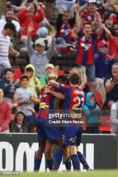 The Jets celebrate a goal by Emile Heskey during the round three A-League match between the Newcastle Jets and the Central Coast Mariners at Hunter...