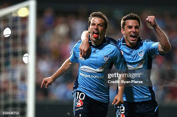 Alessandro Del Piero of Sydney FC celebrates with Krunoslav Lovrek of Sydney FC after Del Piero scored his team's first goal during the round three...