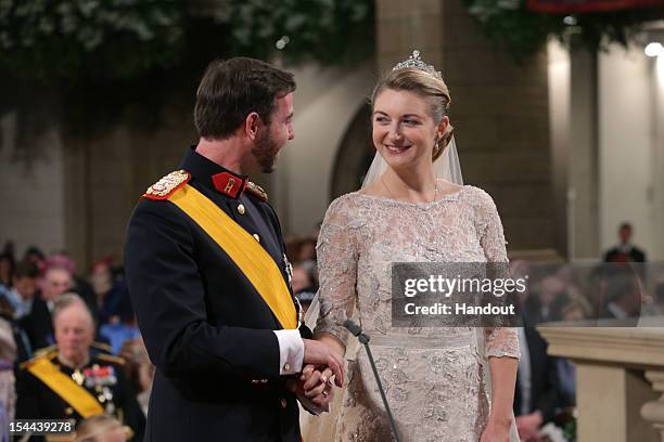 In this handout image provided by the Grand-Ducal Court of Luxembourg, Princess Stephanie of Luxembourg and Crown Prince Guillaume of Luxembourg are...