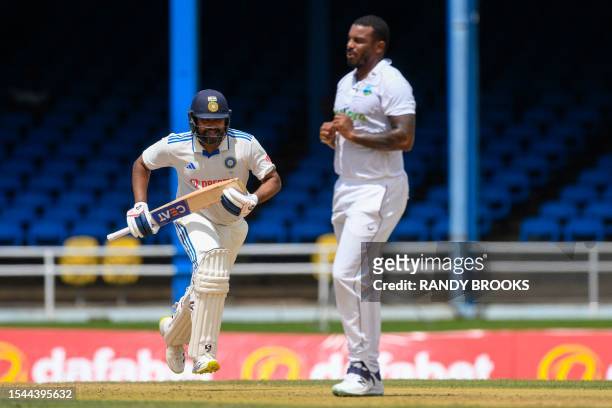 Rohit Sharma of India get runs off Shannon Gabriel of West Indies during the first day of the second Test cricket match between India and West Indies...