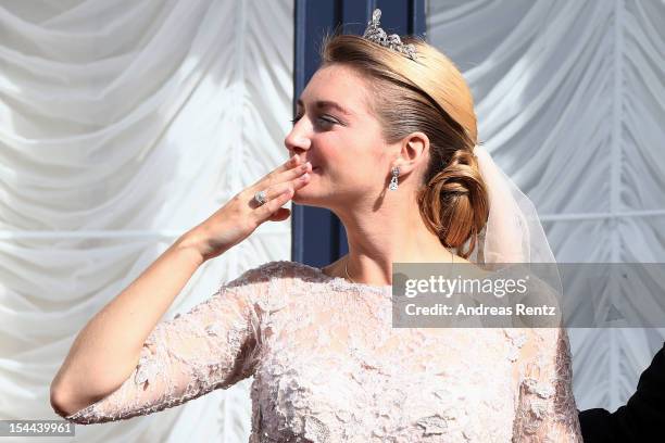 Princess Stephanie of Luxembourg blows a kiss to the crowds from the balcony of the Grand-Ducal Palace following the wedding ceremony of Prince...