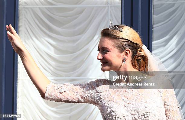 Princess Stephanie of Luxembourg waves to the crowds from the balcony of the Grand-Ducal Palace following the wedding ceremony of Prince Guillaume Of...