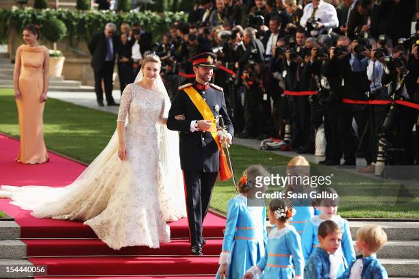 Princess Stephanie of Luxembourg and Prince Guillaume of Luxembourg depart the church after the wedding ceremony of Prince Guillaume Of Luxembourg...