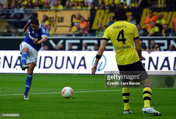 Ibrahim Affelay of Schalke scores his teams first goal during the Bundesliga match between Borussia Dortmund and FC Schalke 04 at Signal Iduna Park...