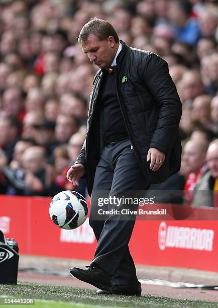 Liverpool Manager Brendan Rogers controls the ball during the Barclays Premier League match between Liverpool and Reading at Anfield on October 20,...