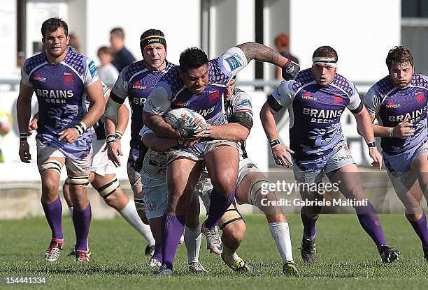 Alfie To'oala of London Welsh runs with the ball during the Amlin Challenge Cup match between I Cavalieri Prato and London Welsh at Stadio Enrico...