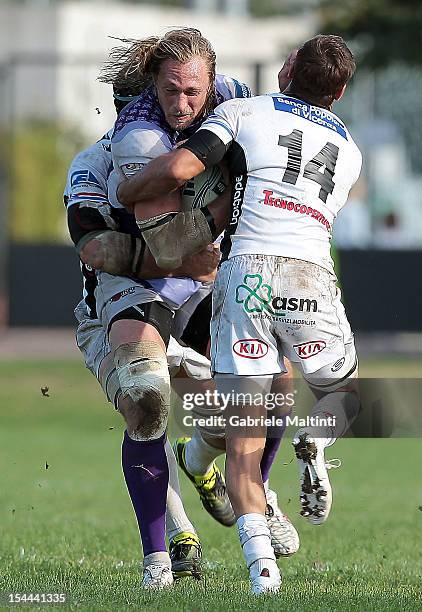 Martin Purdy of London Welsh runs with the ball during the Amlin Challenge Cup match between I Cavalieri Prato and London Welsh at Stadio Enrico...