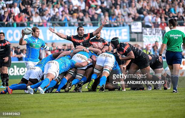 Toulouse's scrum-half Jean-Marc Doussain gestures to a referee during the HCup rugby union match Treviso vs Stade Toulousain at the Comunal Stadio di...