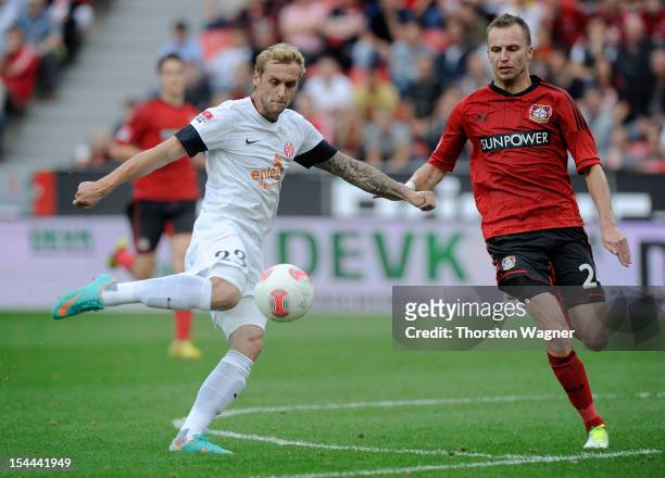 Marcel Risse of Mainz is scoring his teams second goal during the Bundesliga match between Bayer 04 Leverkusen and FSV Mainz 05 at BayArena on...