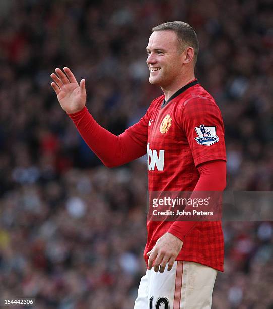 Wayne Rooney of Manchester United celebrates scoring their fourth goal during the Barclays Premier League match between Manchester United and Stoke...
