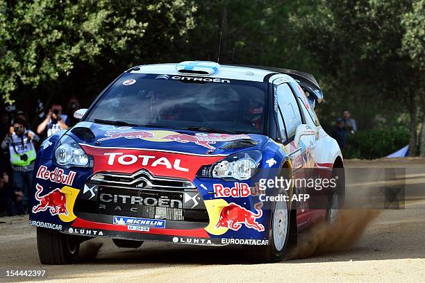 Finland's Mikko Hirvonen and co-driver Jarmo Lehtinen steer their Citroën DS3 WRC during the 9th special stage of the FIA World Rally Championship of...