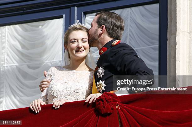 Princess Stephanie of Luxembourg and Prince Guillaume of Luxembourg kiss on the balcony of the Grand-Ducal Palace after their wedding ceremony at the...