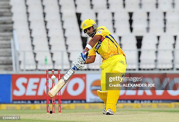 Chennai Super Kings batsman Murali Vijay plays a shot during the Champions League T20 game between The Chennai Super Kings and the Mumbai Indians at...