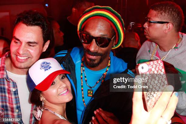 Snoop Dogg poses at the Snoop Dogg Presents: Colt 45 Works Every Time at The Playboy Mansion Party with Evan and Daren Metropulos on October 19, 2012...