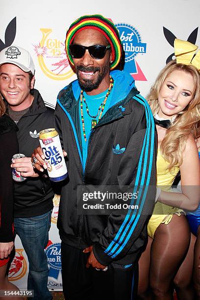 Snoop Dogg poses at the Snoop Dogg Presents: Colt 45 Works Every Time at The Playboy Mansion Party with Evan and Daren Metropulos on October 19, 2012...