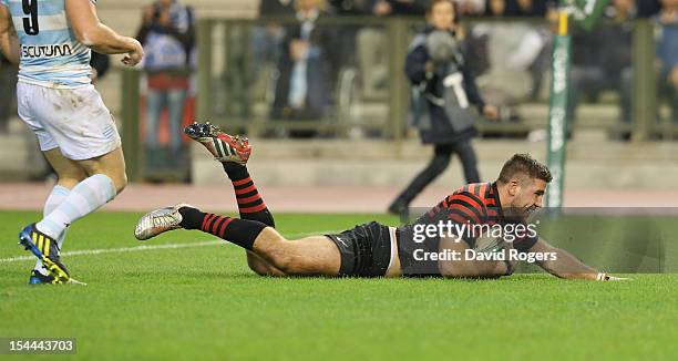 Will Fraser of Saracens scores a try during the Heineken Cup match between Saracens and Racing Metro at King Baudouin Stadium on October 20, 2012 in...