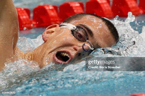 Laszlo Cseh of Hungary competes in the men's 400 m individual medley final during day one of the FINA Swimming World Cup at Eurosportpark on October...