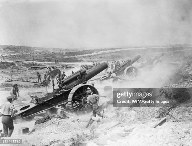 The Battle Of The Somme 1 July - 18 November 1916, Three 8-inch howitzers of 39th Siege Battery, Royal Garrison Artillery , firing from the...