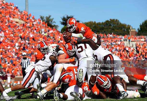 Tajh Boyd of the Clemson Tigers is stopped short as he dives for a touchdown against the Virginia Tech Hokies during their game at Clemson Memorial...