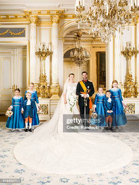 In this handout image provided by the Grand-Ducal Court of Luxembourg and Princess Stephanie of Luxembourg and Prince Guillaume of Luxembourg pose...