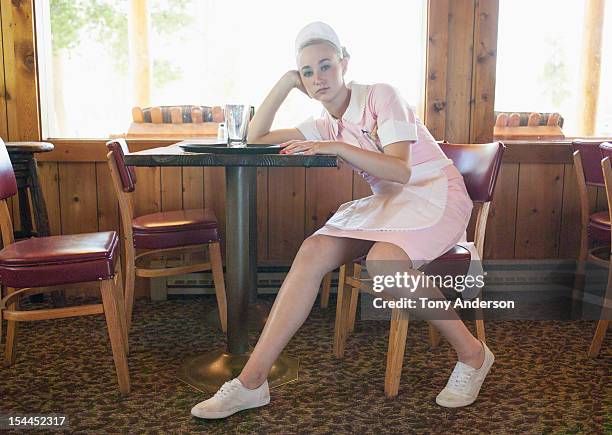 waitress resting after work shift - kellner tablett stock-fotos und bilder