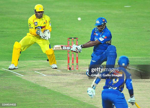 Kieron Pollard of Mumbai reverse sweeps a delivery during the Karbonn Smart CLT20 match between Chennai Super Kings and Mumbai Indians at Bidvest...