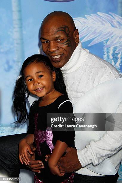 Mike Tyson and daughter Milan Tyson attend "Secret Of Wings" premiere at AMC Loews Lincoln Square on October 20, 2012 in New York City.