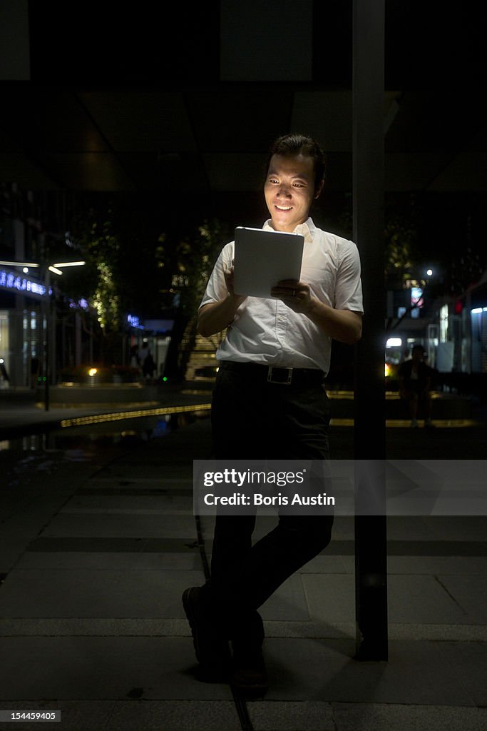 Man on digital tablet