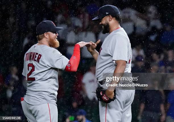 Justin Turner and Kenley Jansen of the Boston Red Sox celebrate their team win over the Chicago Cubs at Wrigley Field on July 14, 2023 in Chicago,...