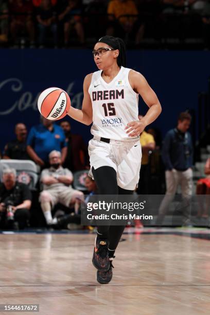 Allisha Gray of the Atlanta Dream dribbles the ball during the game against the Connecticut Sun on July 20, 2023 at the Mohegan Sun Arena in...