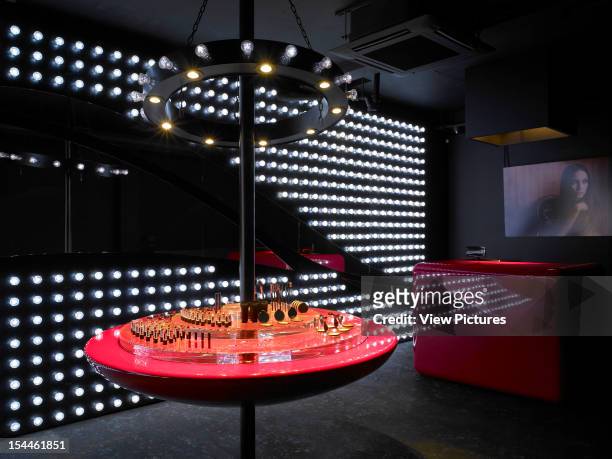 Conduit Street,United Kingdom, Architect London, G-Spot Cosmetics Store - Andy Martin Associates - Detail Of Oval Display Stand With Circular Light...