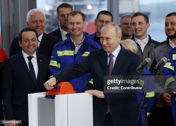 Russian President Vladimir Putin attends an opening ceremony of a new liquefied gas planform of the Novatek company, July 2023, in Murmank, Russia....