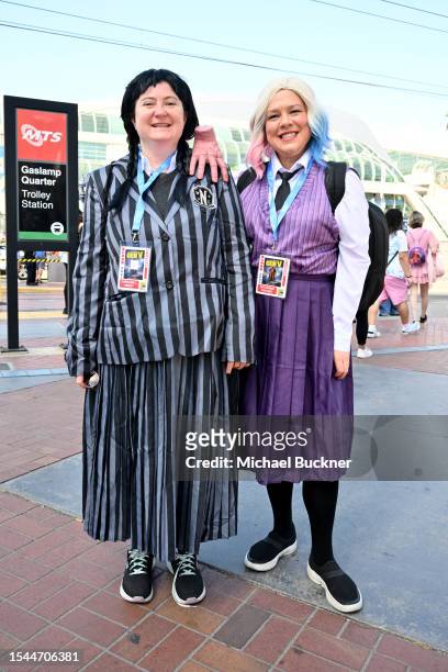 Cosplayers Caroline Kinsey and Katherine Fischer are dressed as Wednesday Addams and Enid Sinclair from the tv series 'Wednesday' at the 2023...