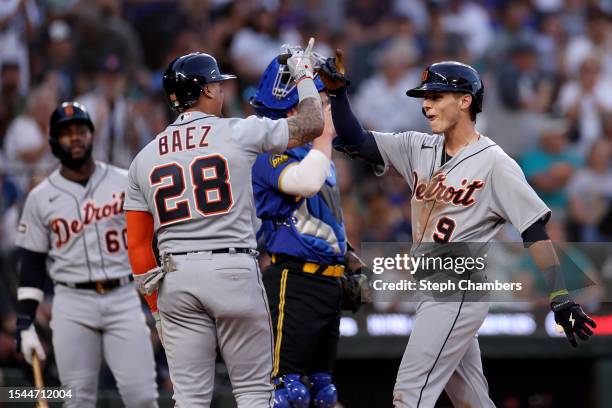 Nick Maton of the Detroit Tigers celebrates his two run home run with Javier Baez against the Seattle Mariners during the seventh inning at T-Mobile...