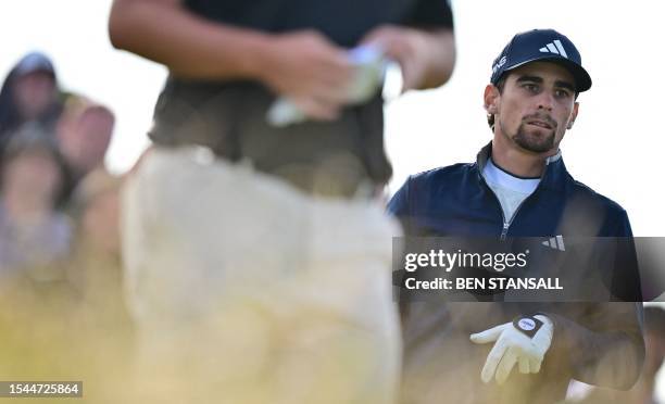Chile's Joaquin Niemann watches his drive from the 15th tee on day one of the 151st British Open Golf Championship Royal Liverpool Golf Course in...