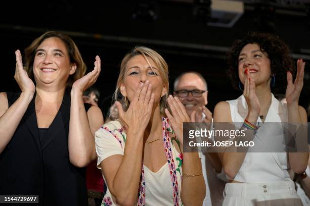 Spain's Deputy Prime Minister, Minister of Labor and Social Economy and radical-left alliance Sumar's candidate Yolanda Diaz, flanked by former mayor...