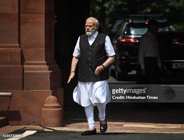 Prime Minister Narendra Modi arrives on the opening day of the monsoon session of the Indian parliament on July 20, 2023 in New Delhi, India.