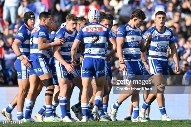 Bulldogs players celebrates scoring a try during the round 20 NRL match between Canterbury Bulldogs and Brisbane Broncos at Belmore Sports Ground on...