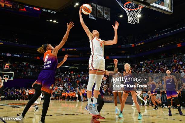 Rebecca Allen of the Connecticut Sun rebounds the ball during the game against the Phoenix Mercury on July 18, 2023 at Footprint Center in Phoenix,...