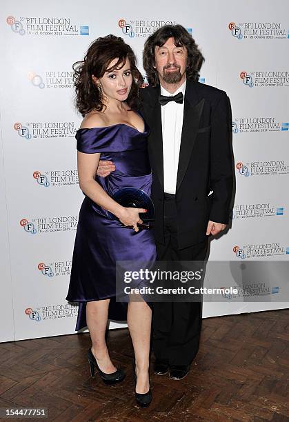 Helena Bonham Carter poses with her BFI Fellowship award and Sir Trevor Nunn during the 56th BFI London Film Festival Awards at the Banqueting House...