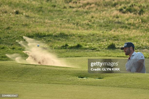 Sweden's David Lingmerth plays out of a bunker onto the 18th green on day one of the 151st British Open Golf Championship at Royal Liverpool Golf...