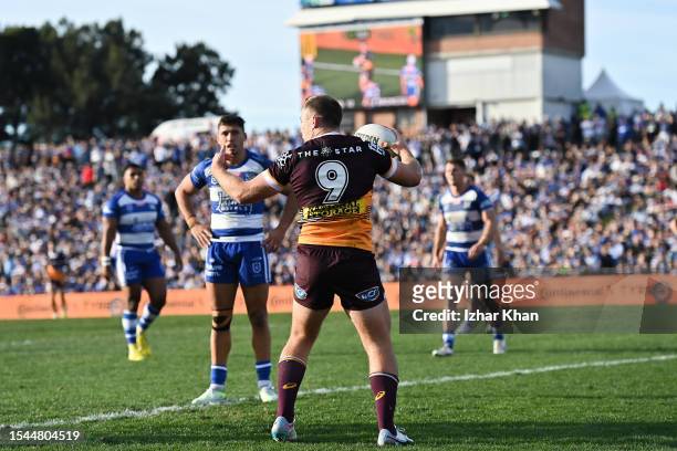 Billy Walters of the Broncos celebrates scoring a try during the round 20 NRL match between Canterbury Bulldogs and Brisbane Broncos at Belmore...