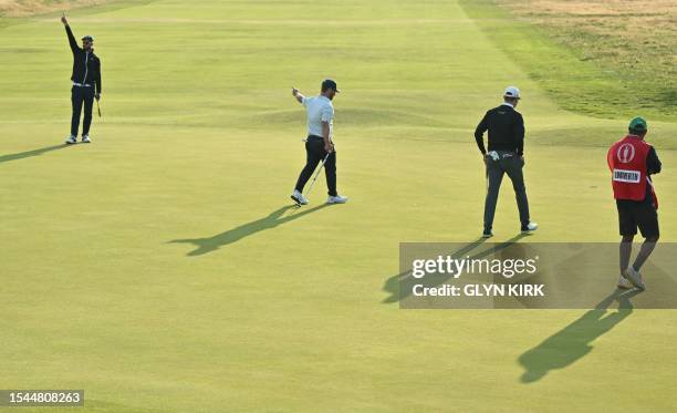 South Africa's Ockert Strydom celebrates his putt on the 18th green on day one of the 151st British Open Golf Championship at Royal Liverpool Golf...
