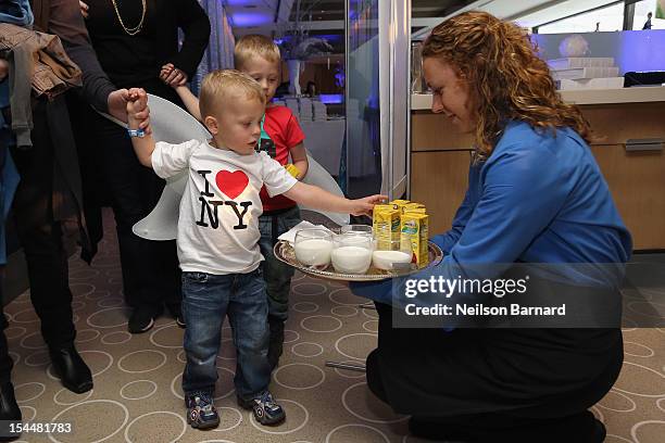 Guests attend the New York premiere of Disney's "Secret Of The Wings" reception at Rockefeller Center on October 20, 2012 in New York City.