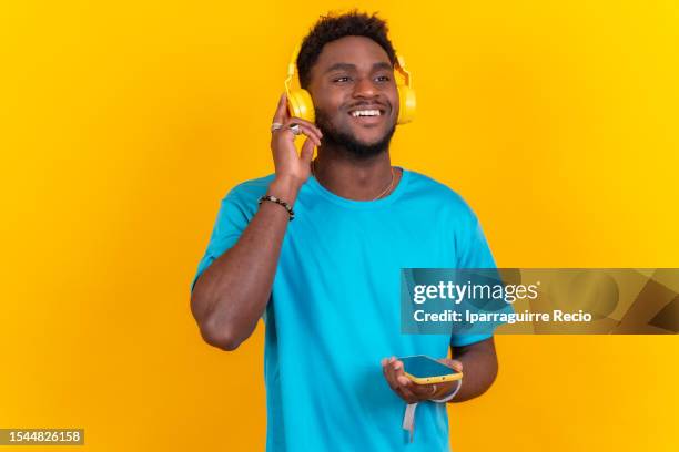 rapper holding microphone photos and premium high res... 1,326 Rapper Holding Microphone Stock Photos, High-Res Pictures, and ...